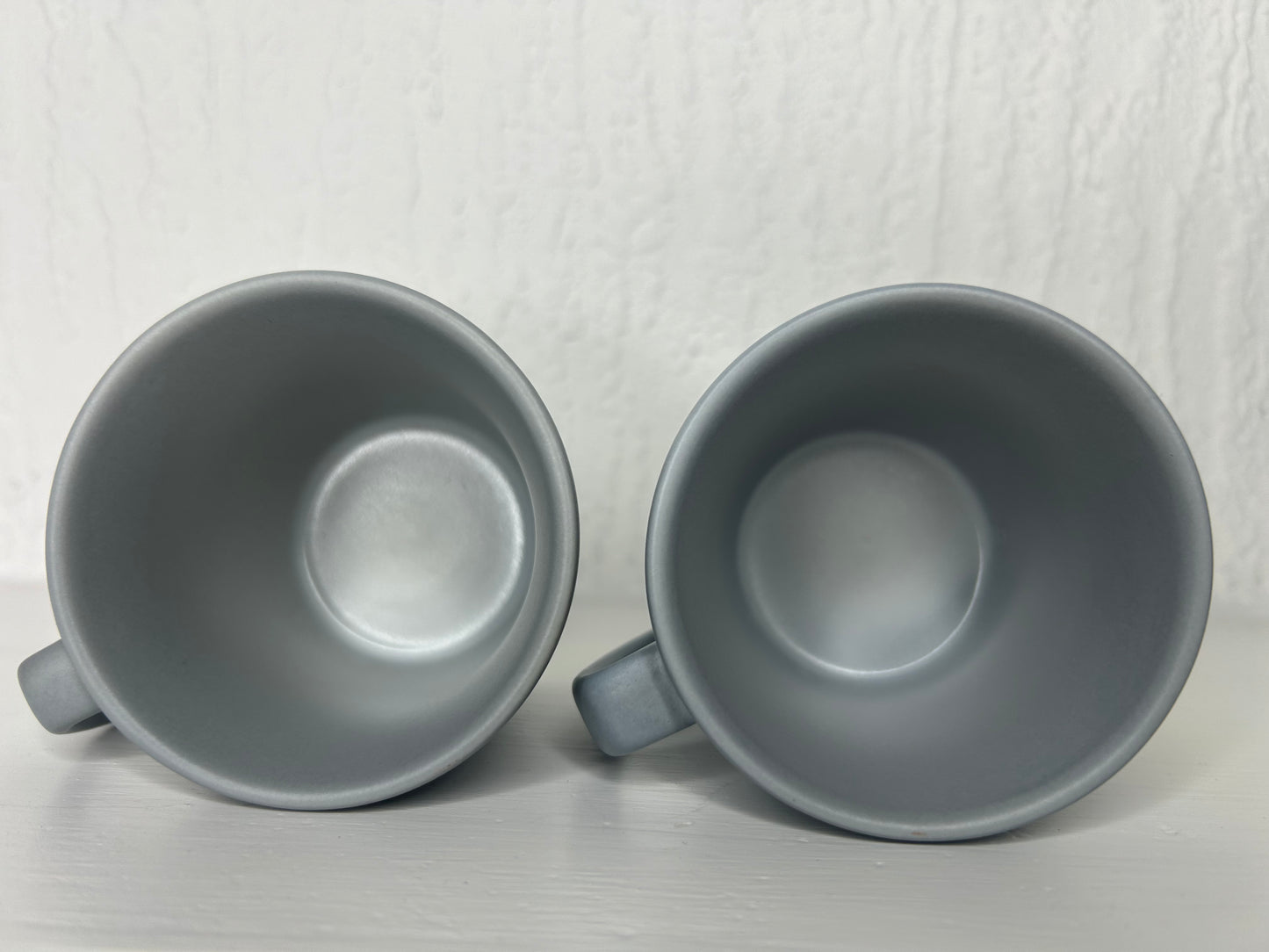 Side angle of Starbucks Stone Grey Espresso Mugs set