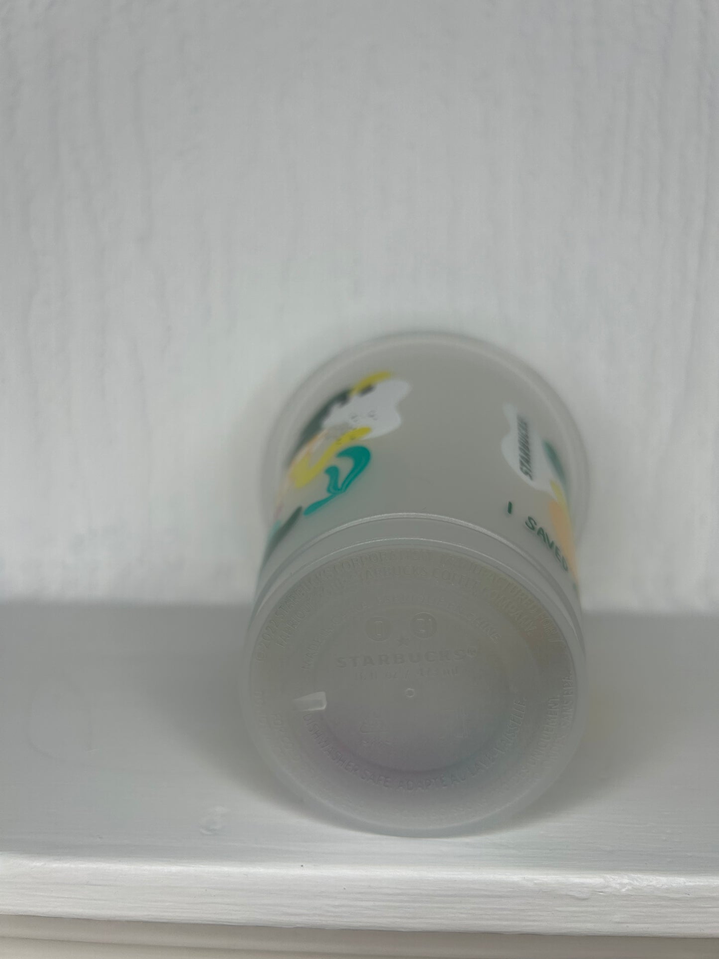 Side angle of Starbucks Forget Me Not 12oz Tumbler with straw