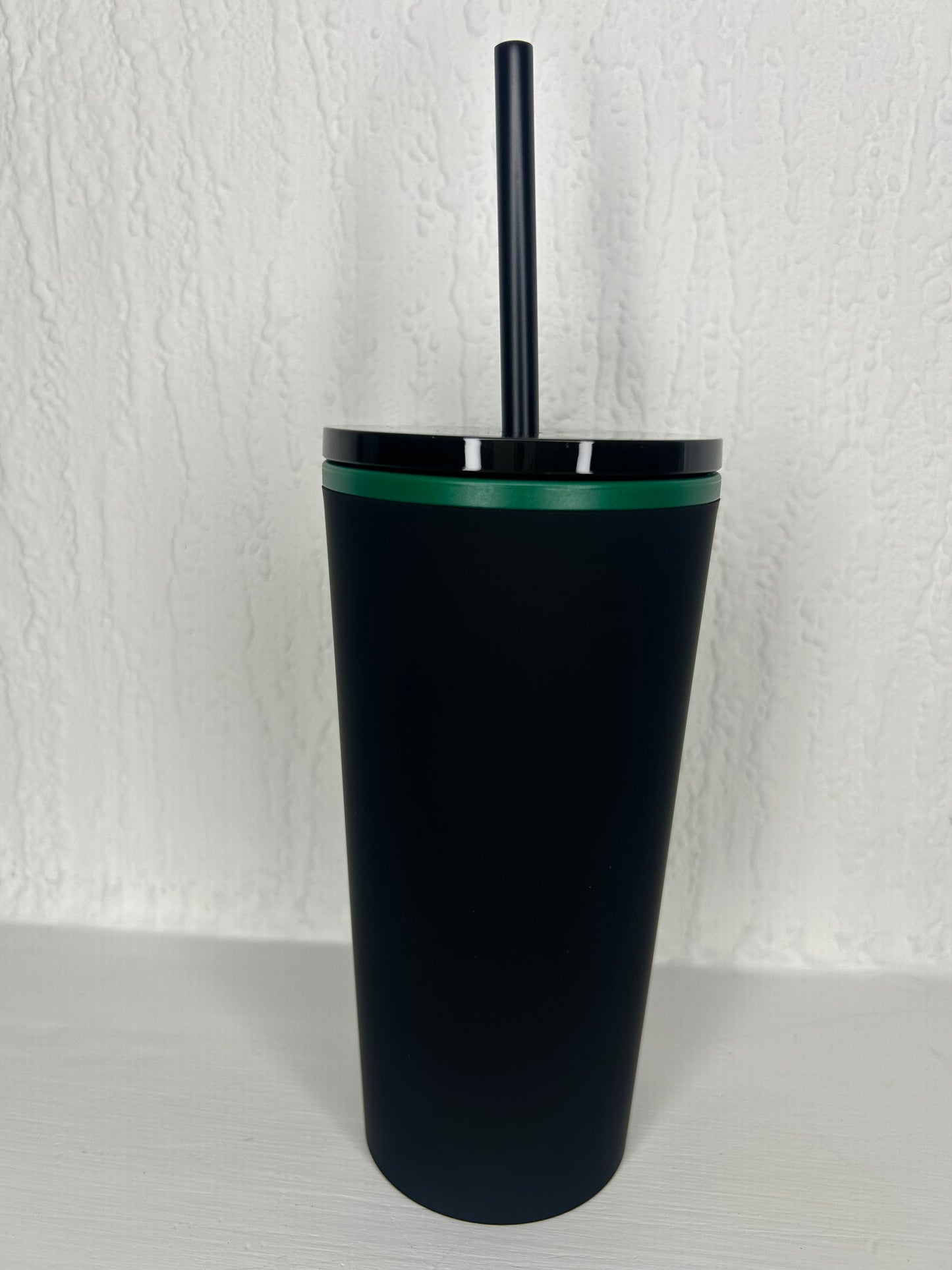 Side view of reusable Starbucks matte black tumbler 12oz