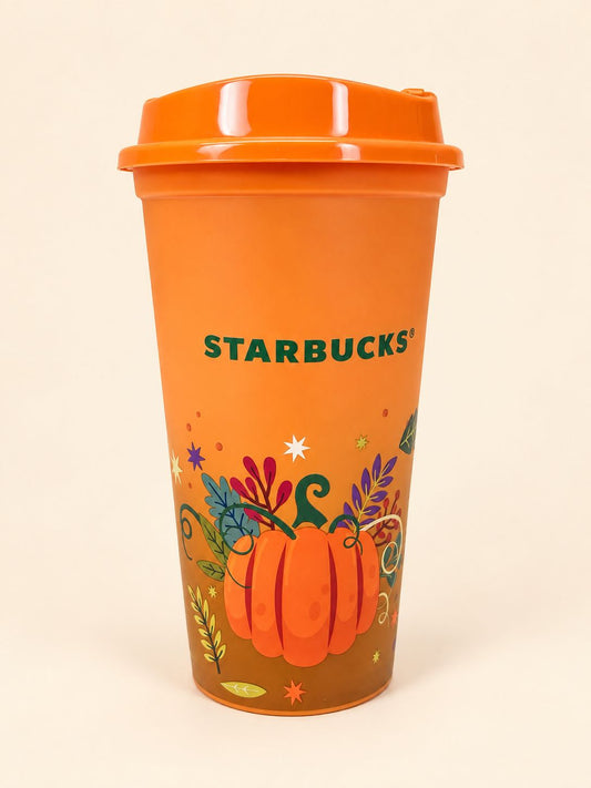 Starbucks orange pumpkin reusable cup with autumn design