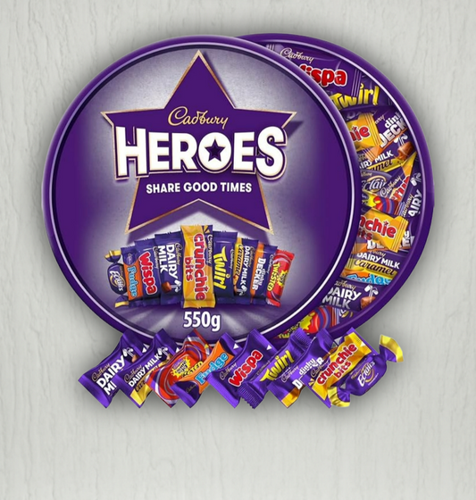 Cadbury Heroes chocolate assortment in a purple 'Shark Cage' packaging on a light gray background.