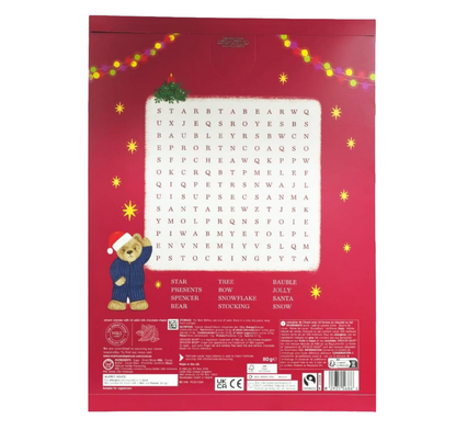 Red packaging with Christmas-themed text and graphics, featuring a bear in a Santa hat.