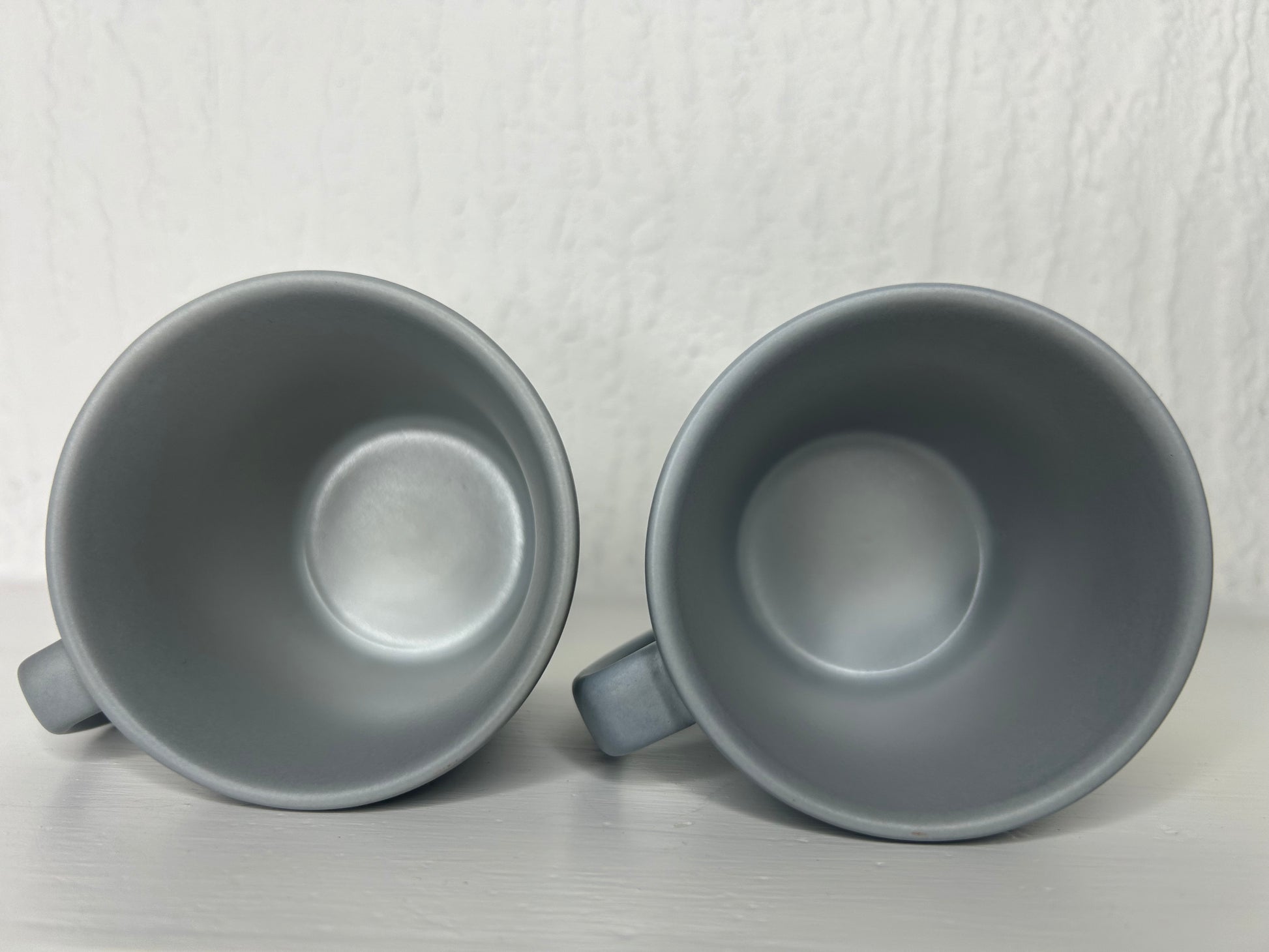 Side angle of Starbucks Stone Grey Espresso Mugs set