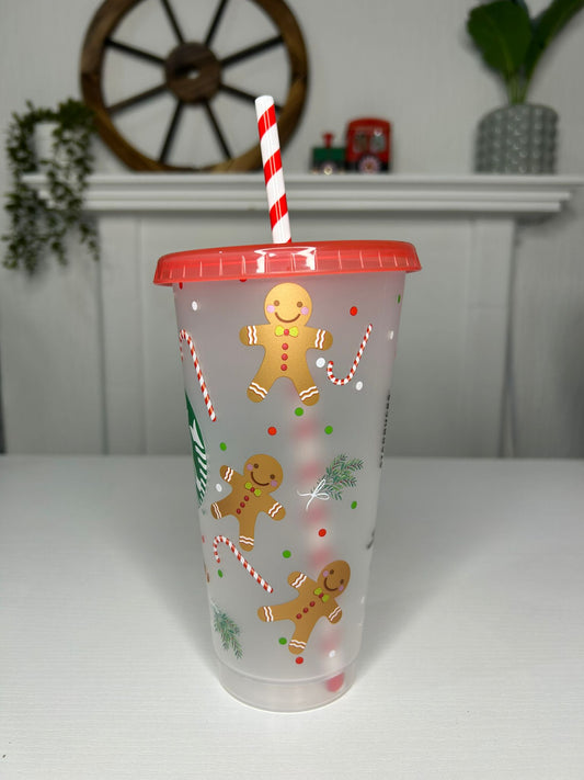 Limited edition Starbucks holiday tumbler with candy cane and gingerbread design