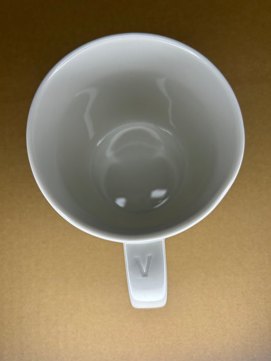Side angle of Starbucks White Venti Mug with embossed siren logo